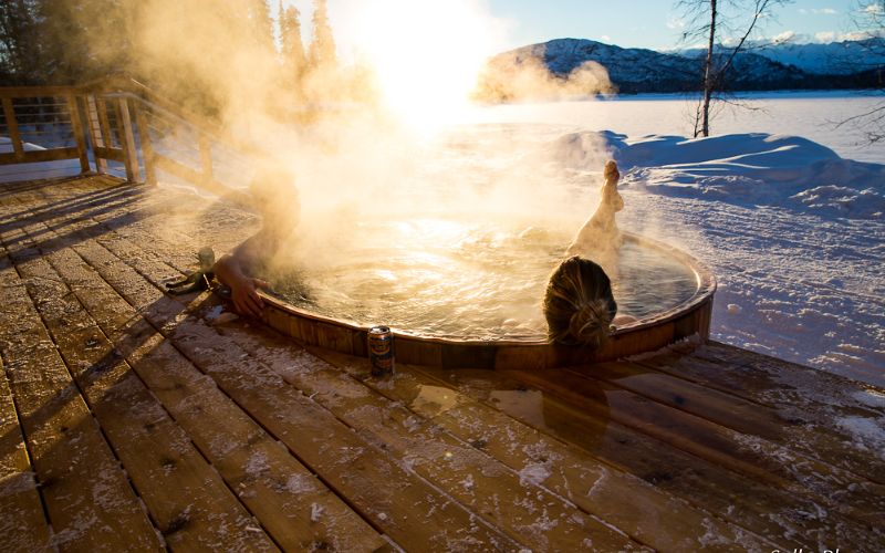 helicopter-skiing-customers-enjoying-a-jacuzzi-min