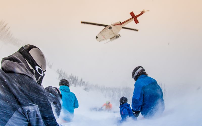 Heli-skiing-canada-chopper-taking-off-min